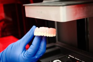 dentures vs dental implants